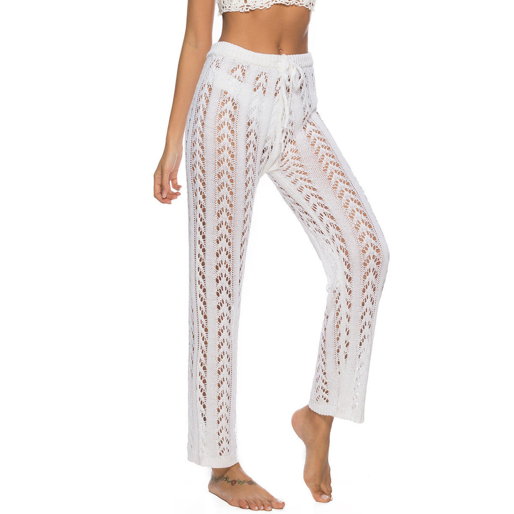 Women's elegant crochet beach trousers with a breezy fit and elastic waistband, size
