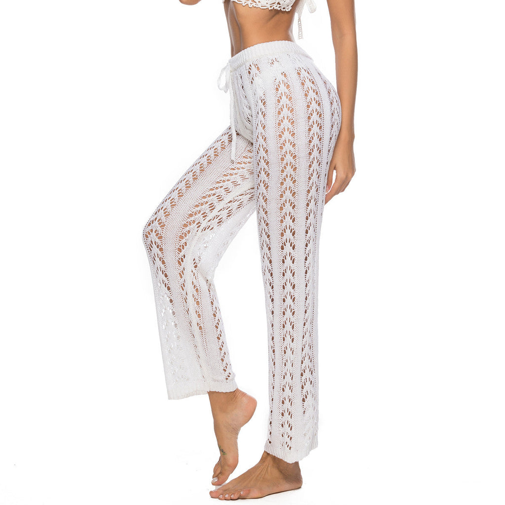 Women's elegant crochet beach trousers with a breezy fit and elastic waistband, size
