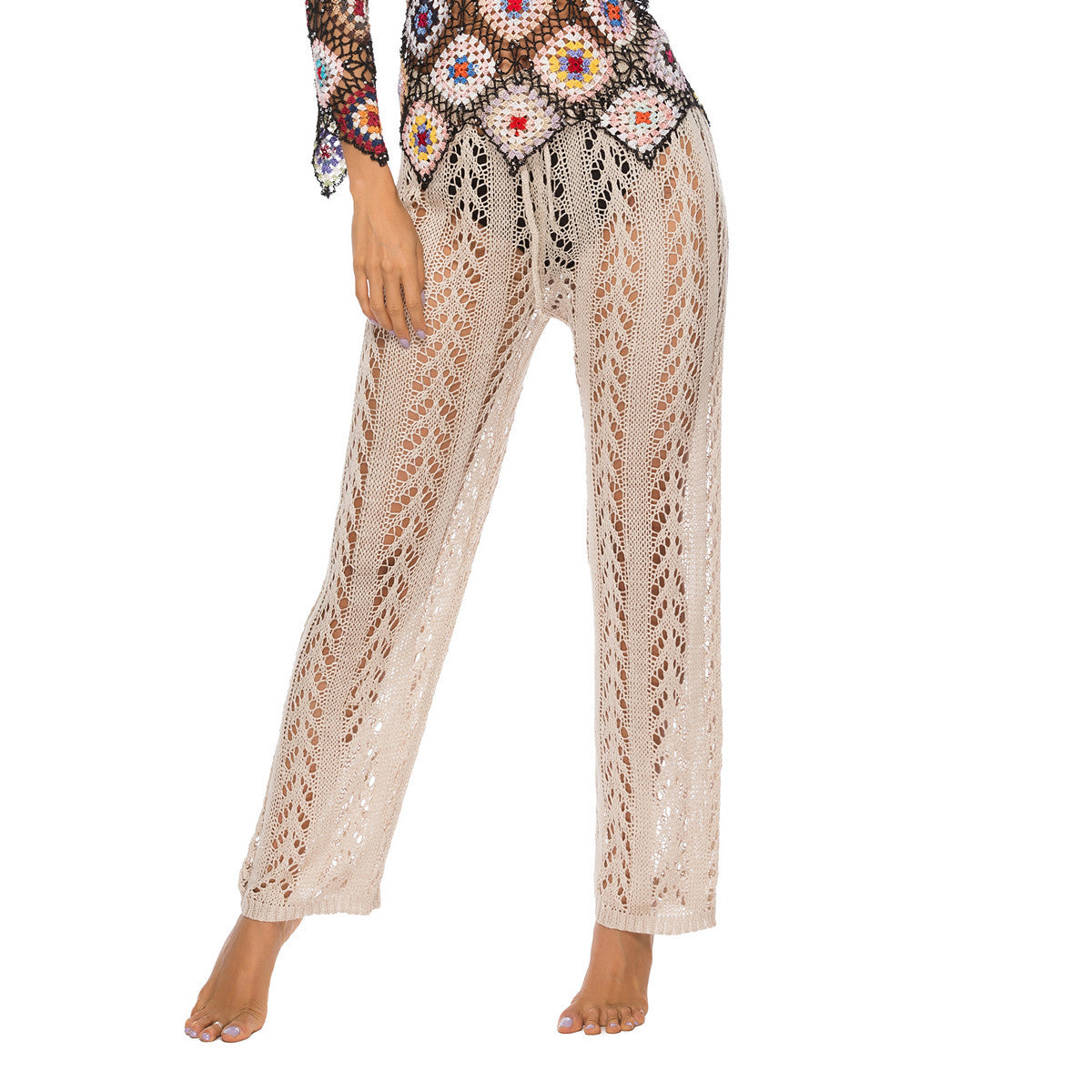 Women's elegant crochet beach trousers with a breezy fit and elastic waistband, size