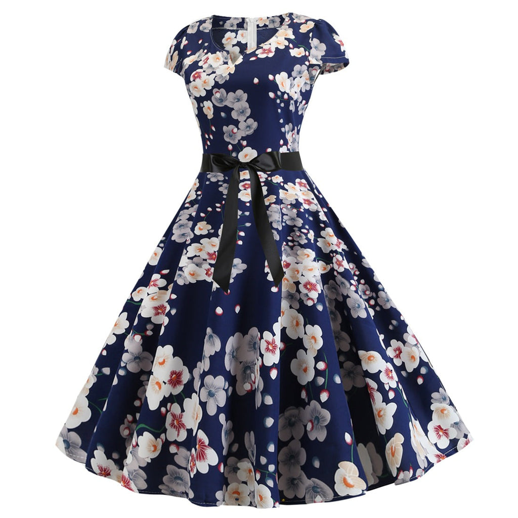 Valenzora | Women's dress for wedding guests with a wide hem