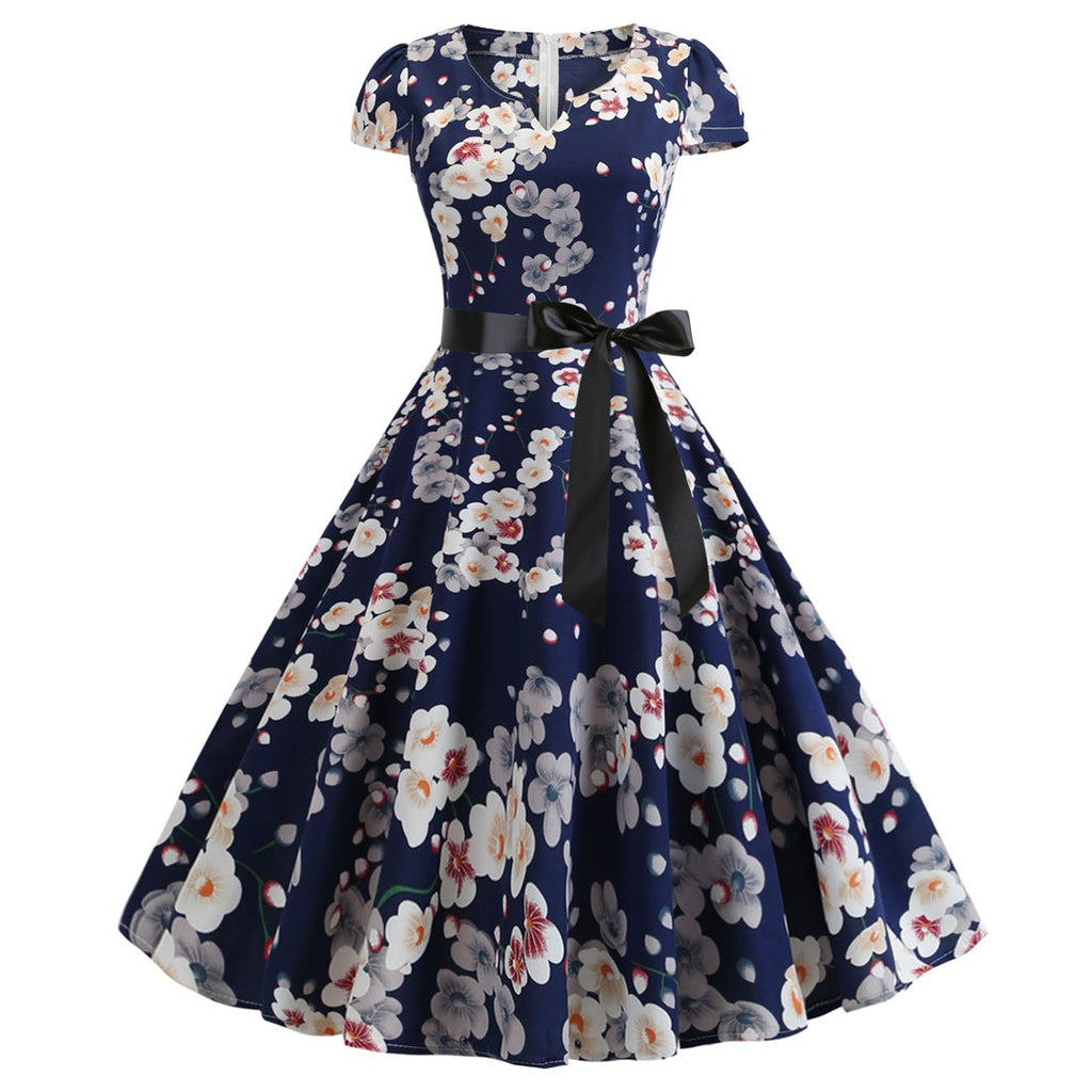 Valenzora | Women's dress for wedding guests with a wide hem