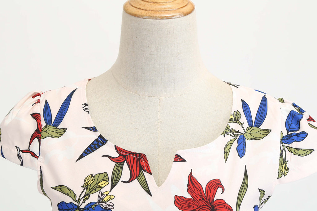 Valenzora | Women's dress for wedding guests with a wide hem