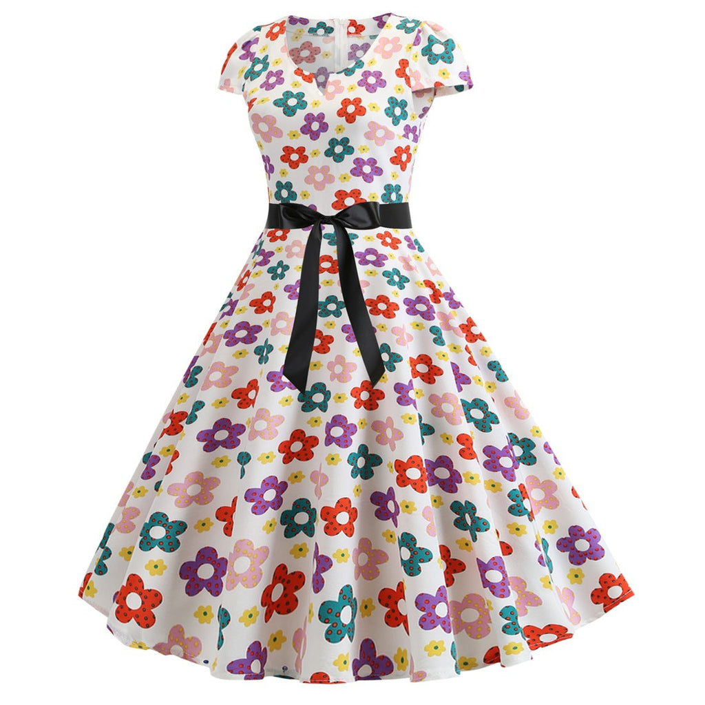 Valenzora | Women's dress for wedding guests with a wide hem