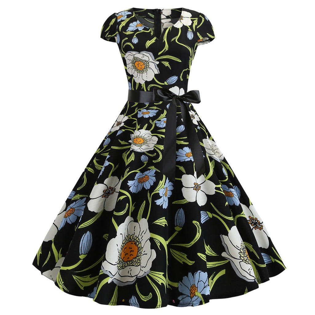 Valenzora | Women's dress for wedding guests with a wide hem