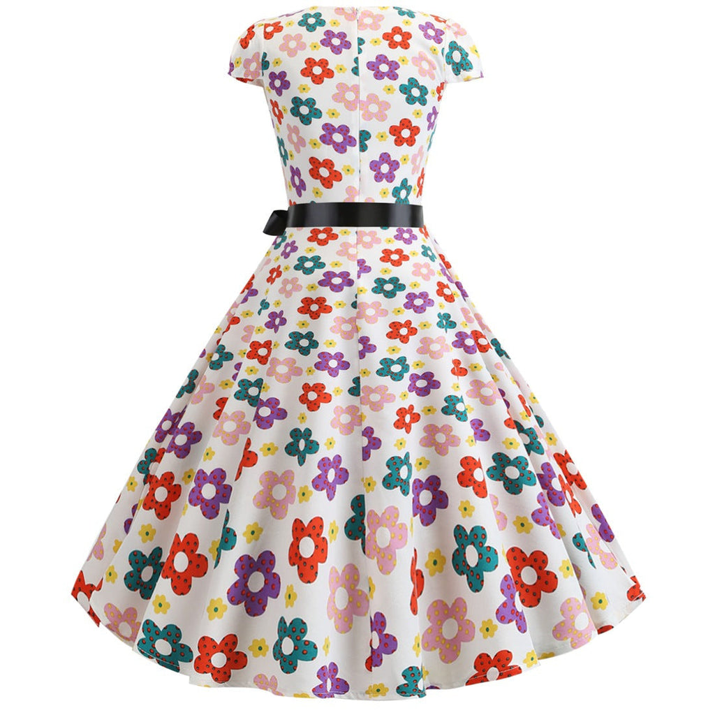 Valenzora | Women's dress for wedding guests with a wide hem
