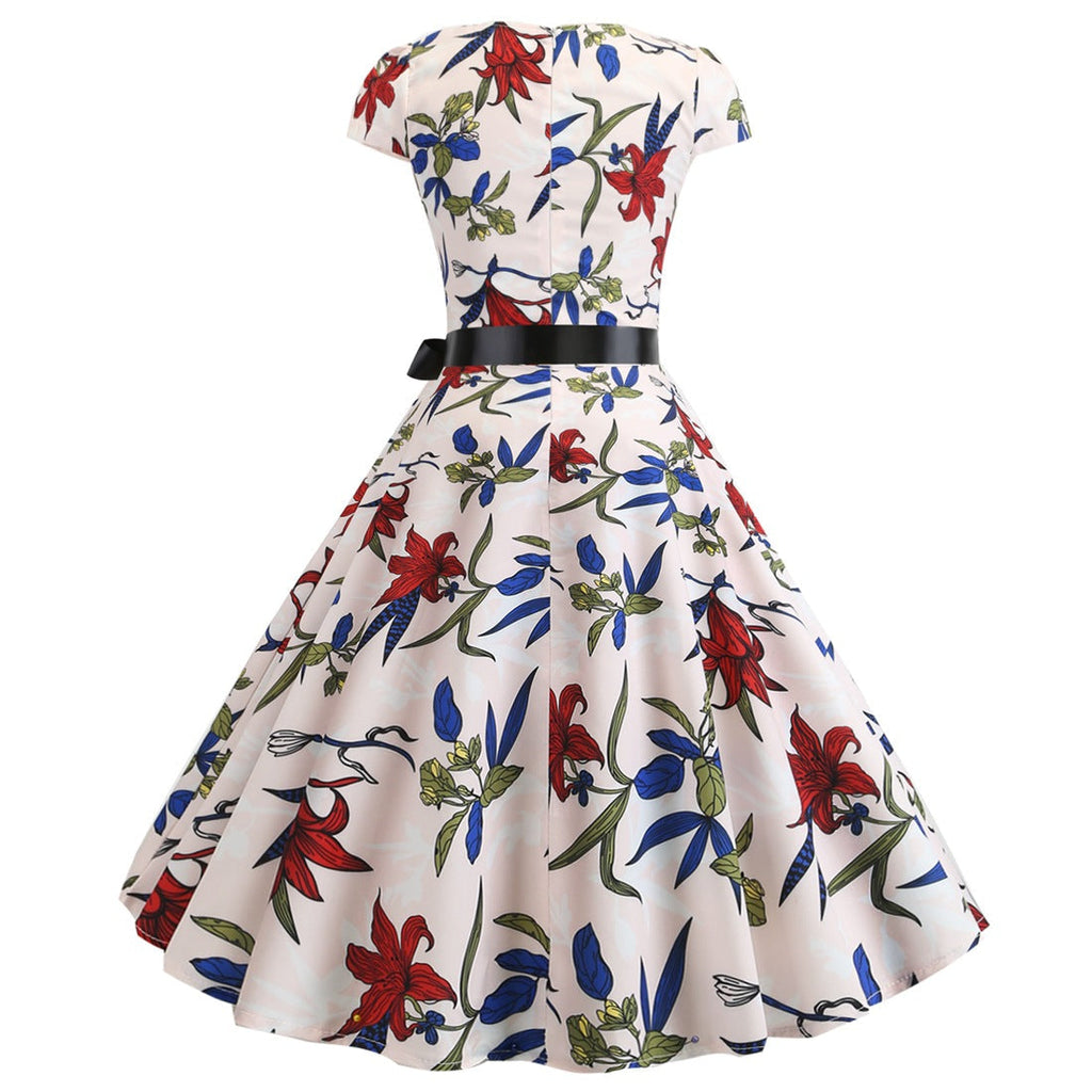Valenzora | Women's dress for wedding guests with a wide hem