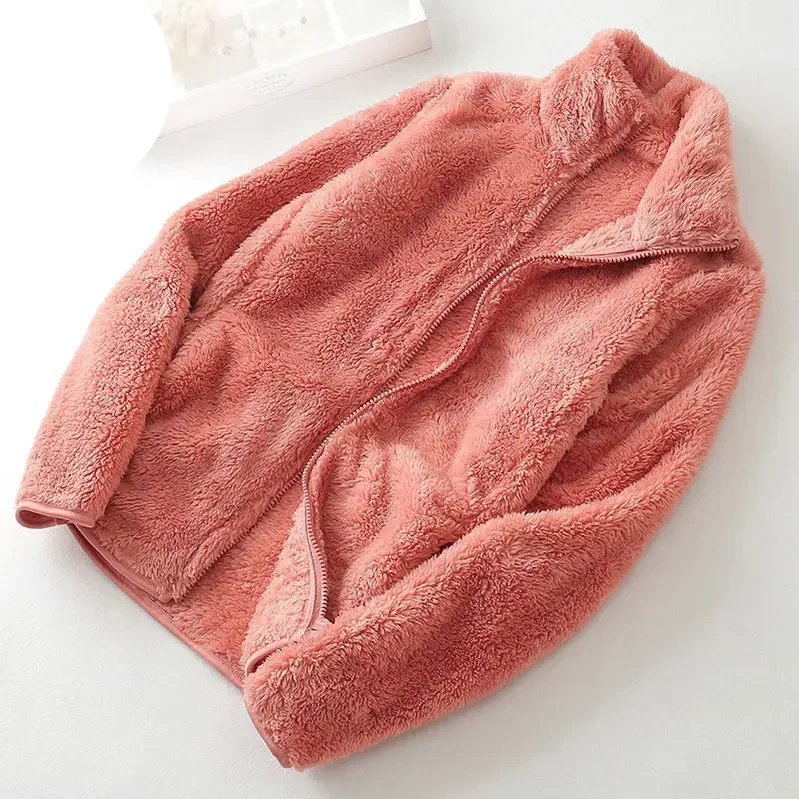 and a fluffy jacket with a zipper, fleece vest