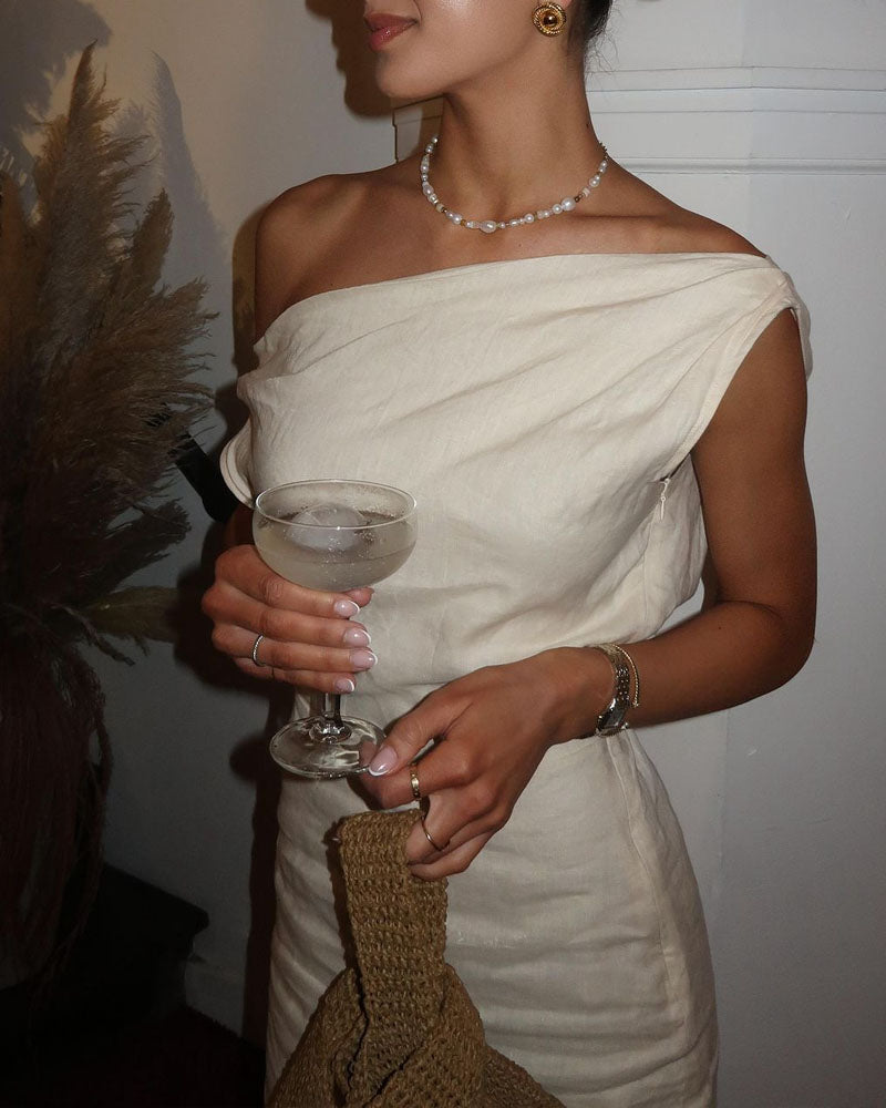 Linen dress with slanted shoulders