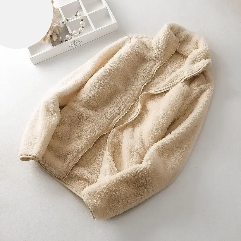 and a fluffy jacket with a zipper, fleece vest