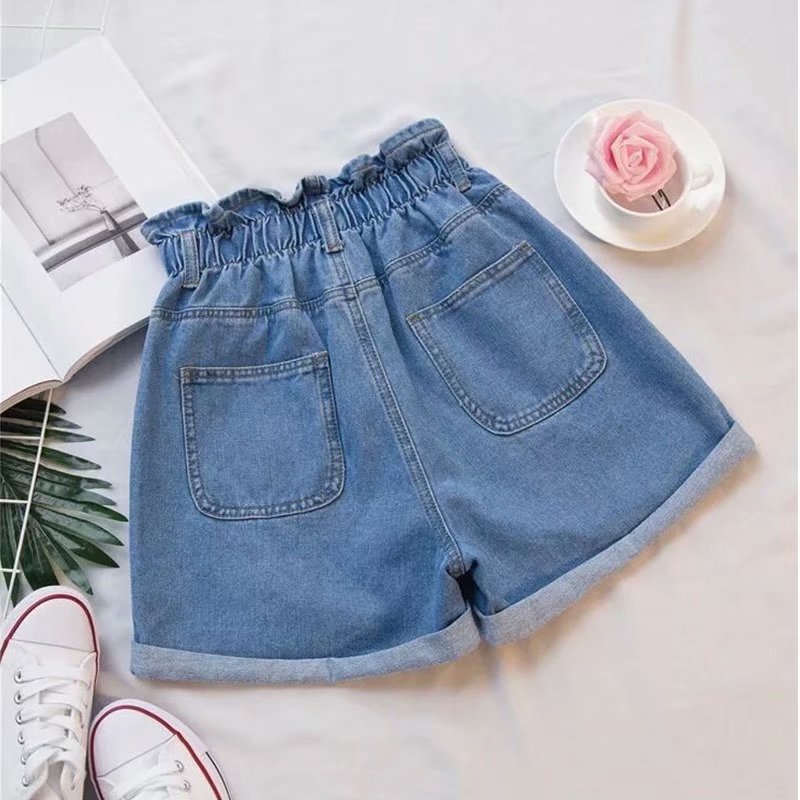 Women's denim shorts with a high waist and elasticated waistband, size S