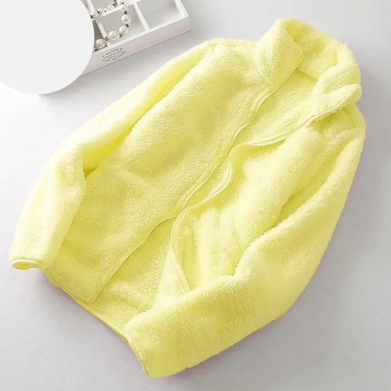 and a fluffy jacket with a zipper, fleece vest