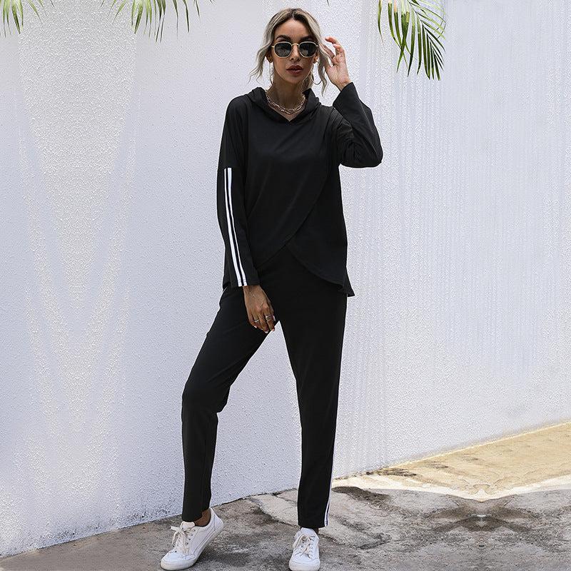 Women's tracksuit with a modern cut and graphic accents, size