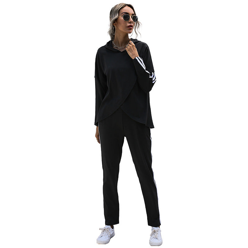Women's tracksuit with a modern cut and graphic accents, size