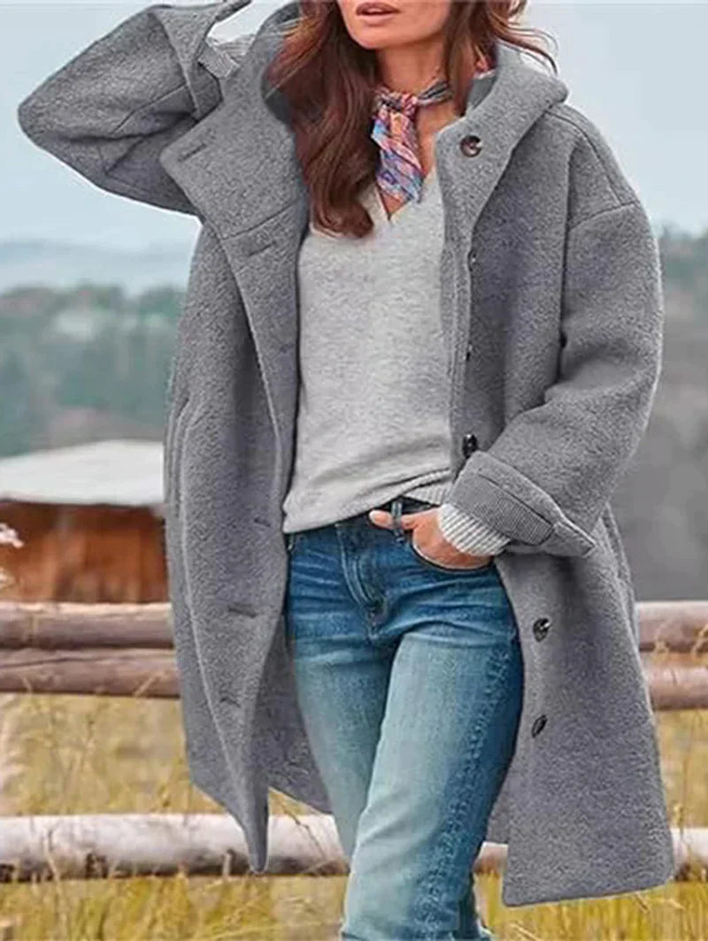 Long-sleeved, single-breasted, loose-fitting coat with a turn-down collar