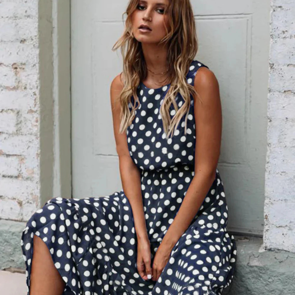 Valenzora | Black Polka Dot Midi Dress for a Retro Chic Look