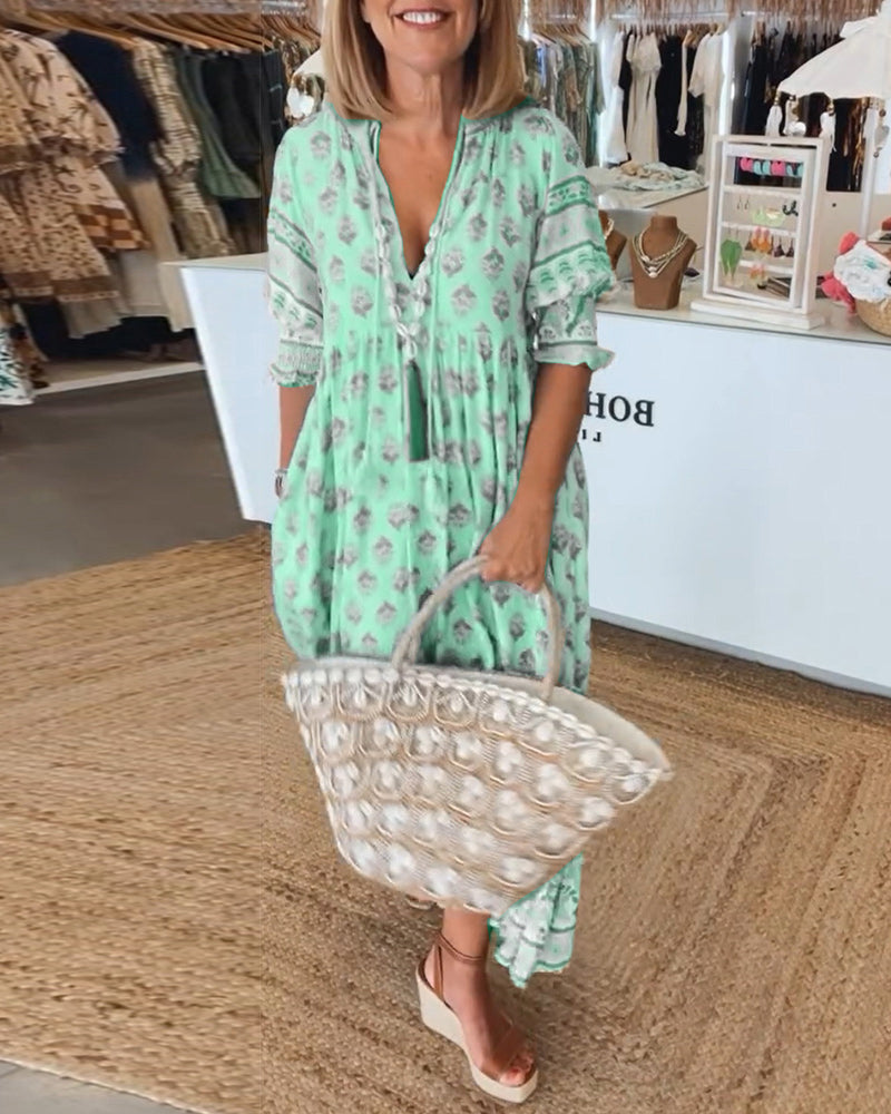 Valenzora | Casual printed dress with V-neck and half-length sleeves