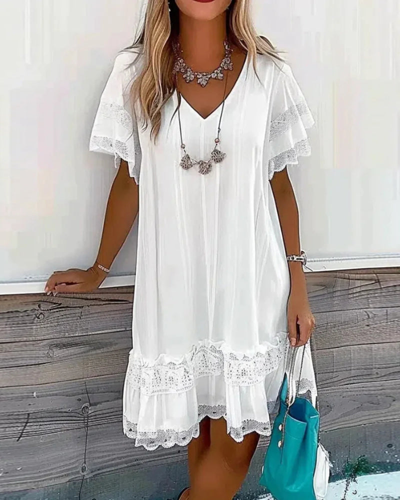 Valenzora | Short-sleeved white summer dress with lace panels