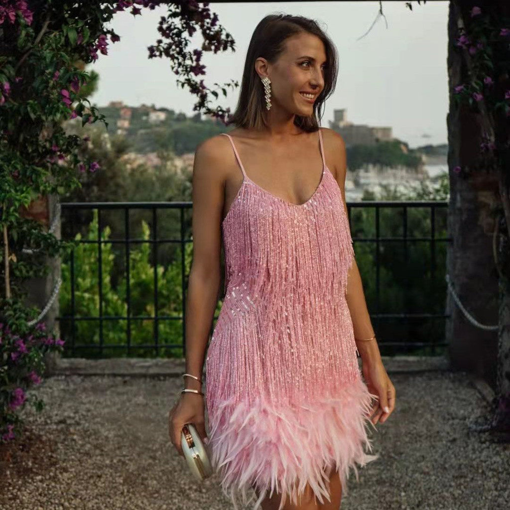 Valenzora | Party-taugliches Kleid mit Federquasten und Pailletten