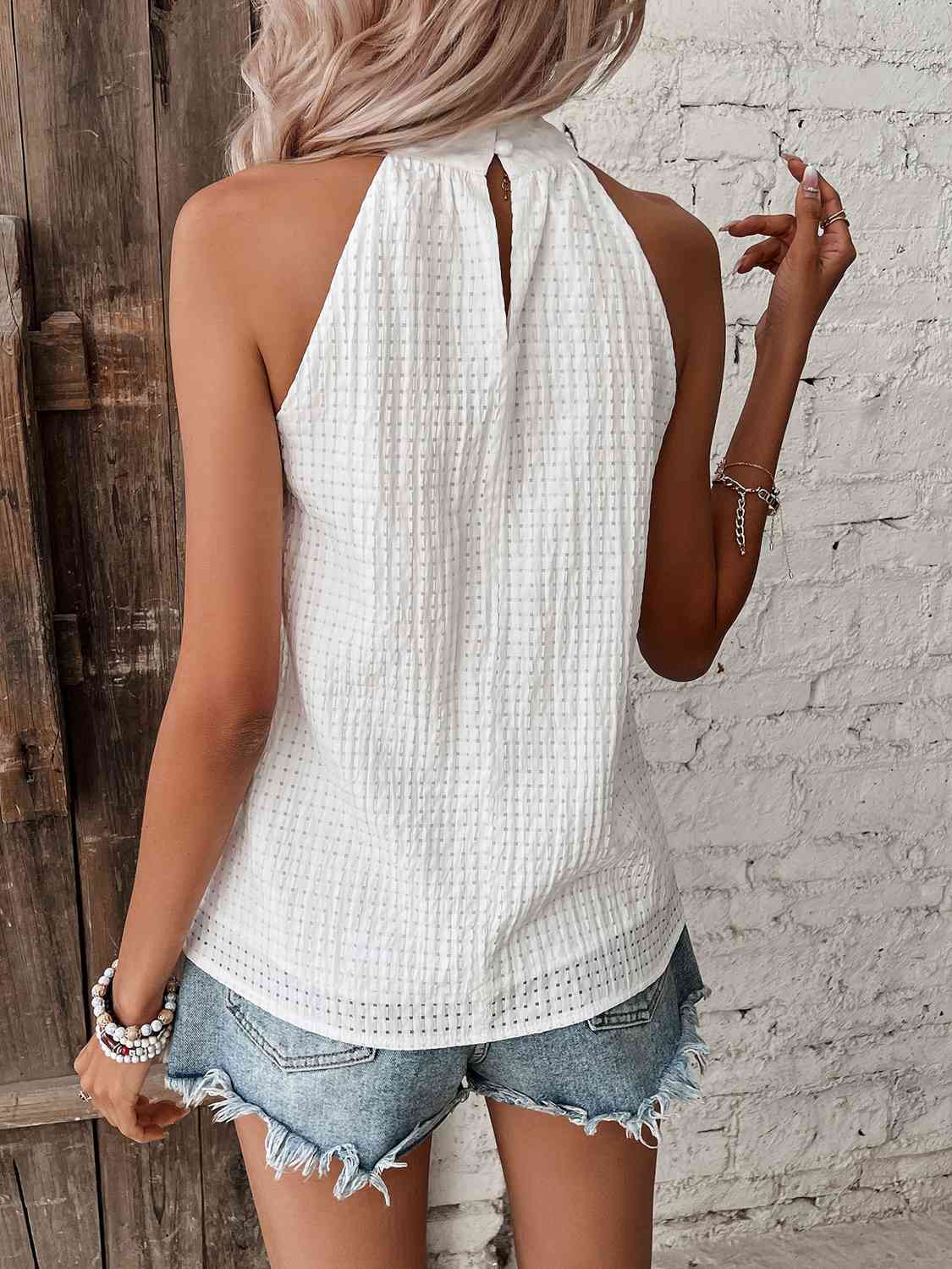 Valenzora | Halterneck top with polka dot detail