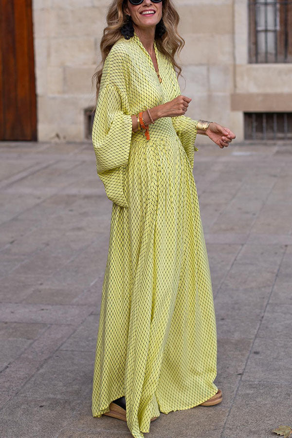 Valenzora | Long-sleeved V-neck dress, loose fit, fitted silhouette, flowing hem, elegant style