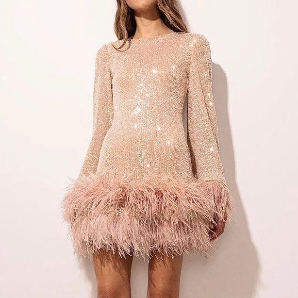 Valenzora | Glamorous sequined dress with feather hem detail