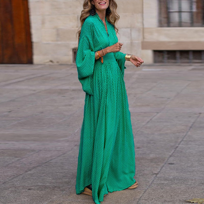 Valenzora | Long-sleeved V-neck dress, loose fit, fitted silhouette, flowing hem, elegant style