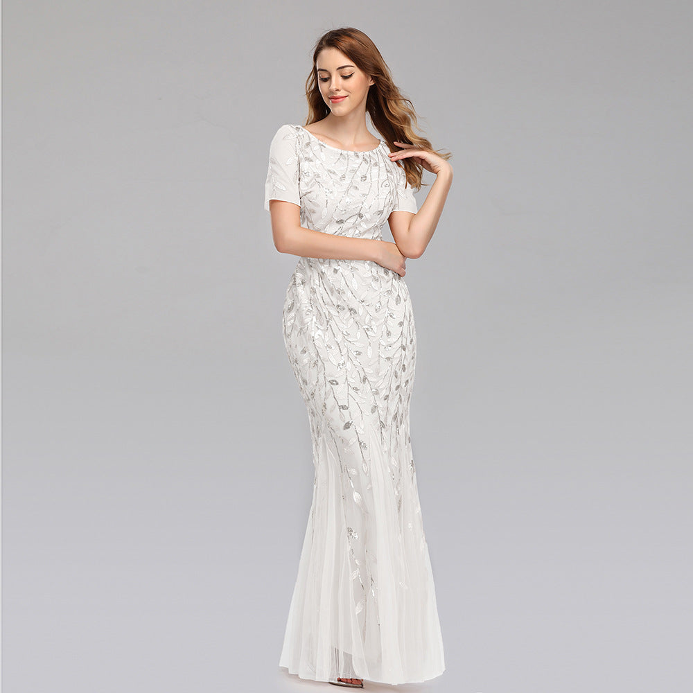 Valenzora | Elegant evening dress in gold