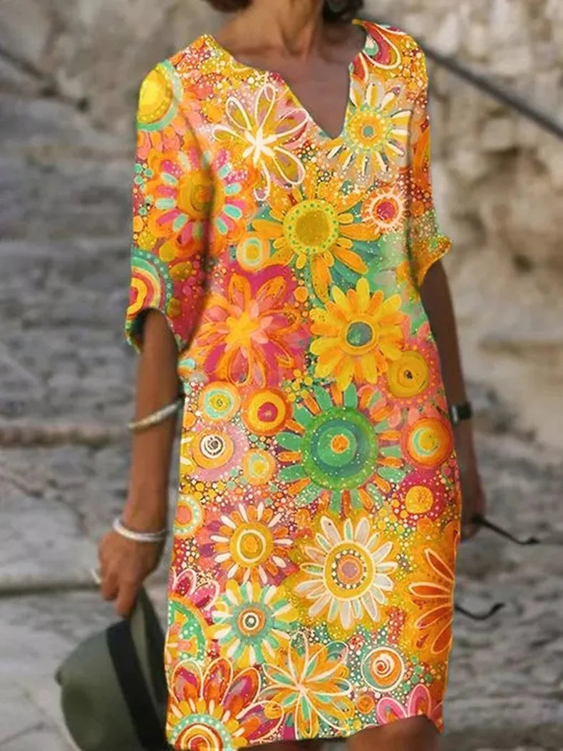 Valenzora | Midi dress with V-neck and floral pattern