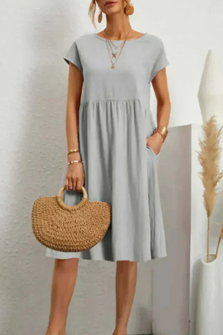 Valenzora | Plain, casual dress with short sleeves and a round neckline
