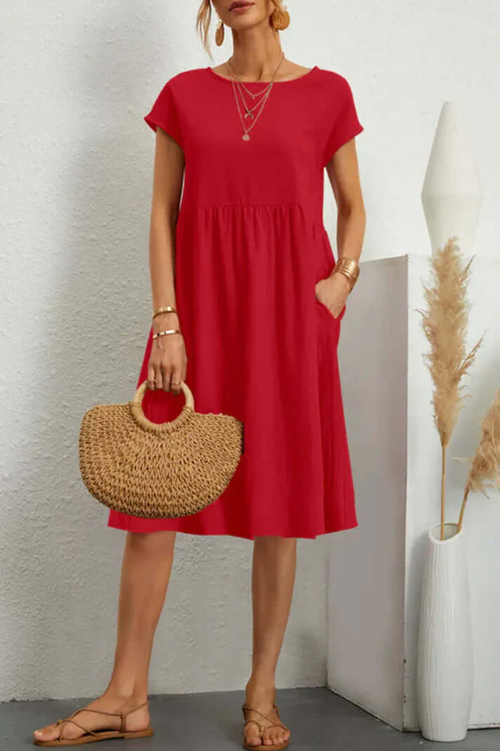 Valenzora | Plain, casual dress with short sleeves and a round neckline