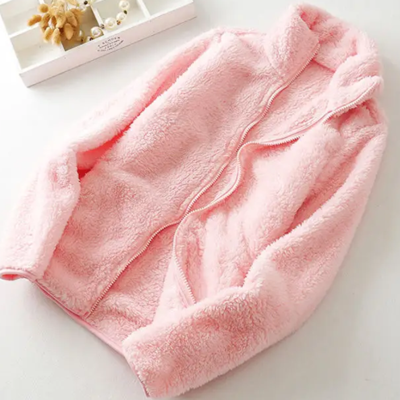 and a fluffy jacket with a zipper, fleece vest