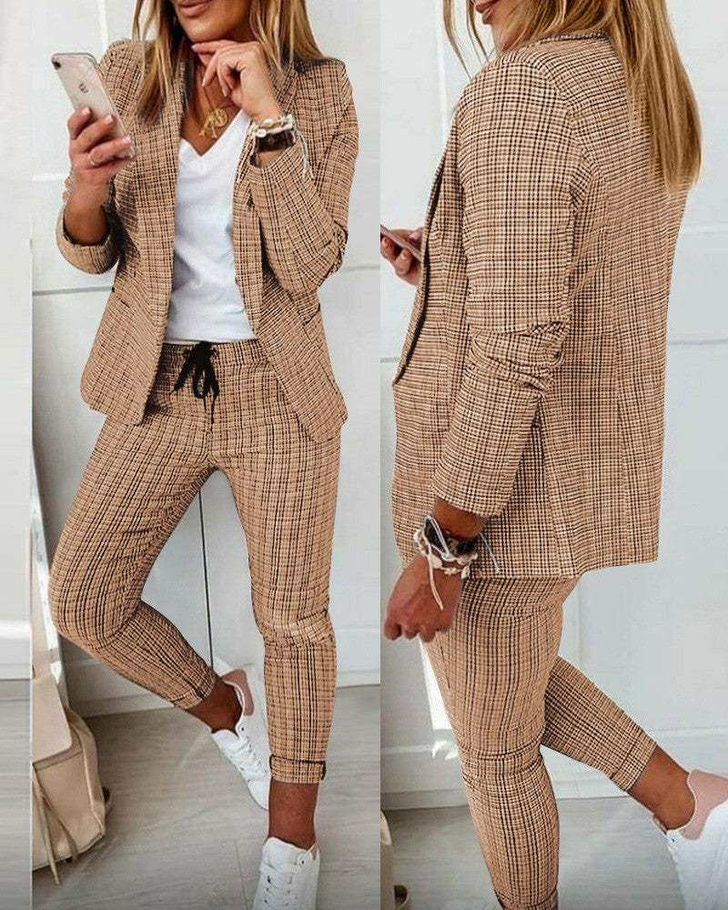 Valenzora Suit Set: Modern two-piece suit with wide-leg trousers and a tailored blazer jacket