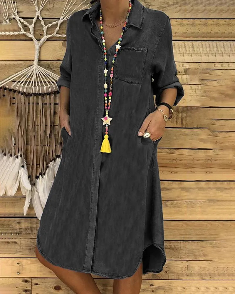 Valenzora | Denim midi dress with rolled-up sleeves and chest pocket.