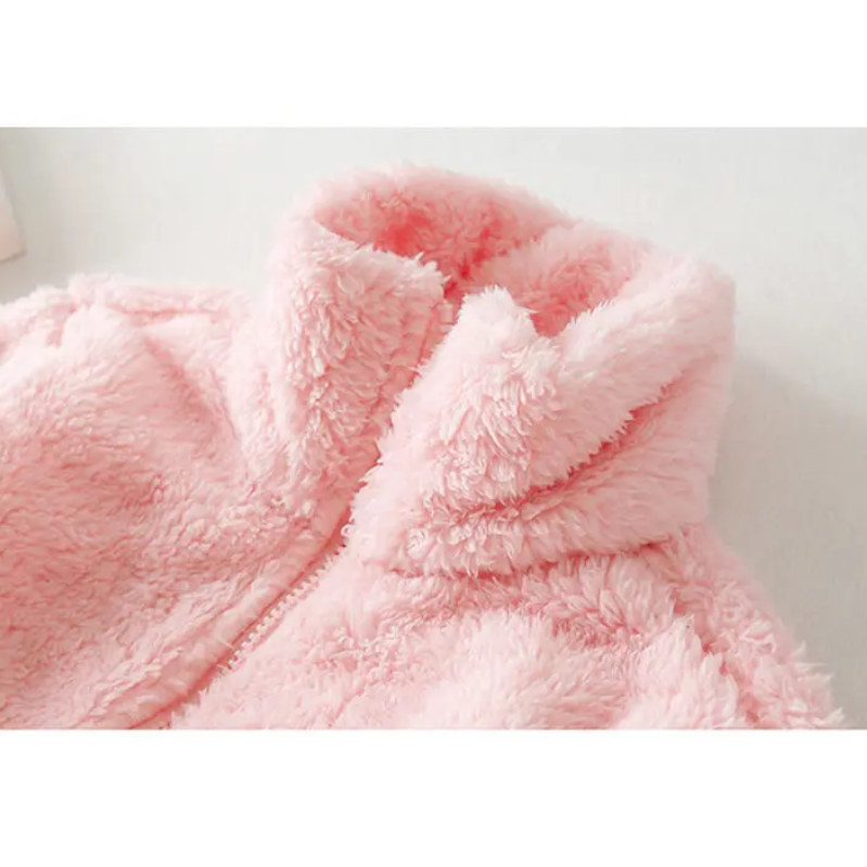 and a fluffy jacket with a zipper, fleece vest