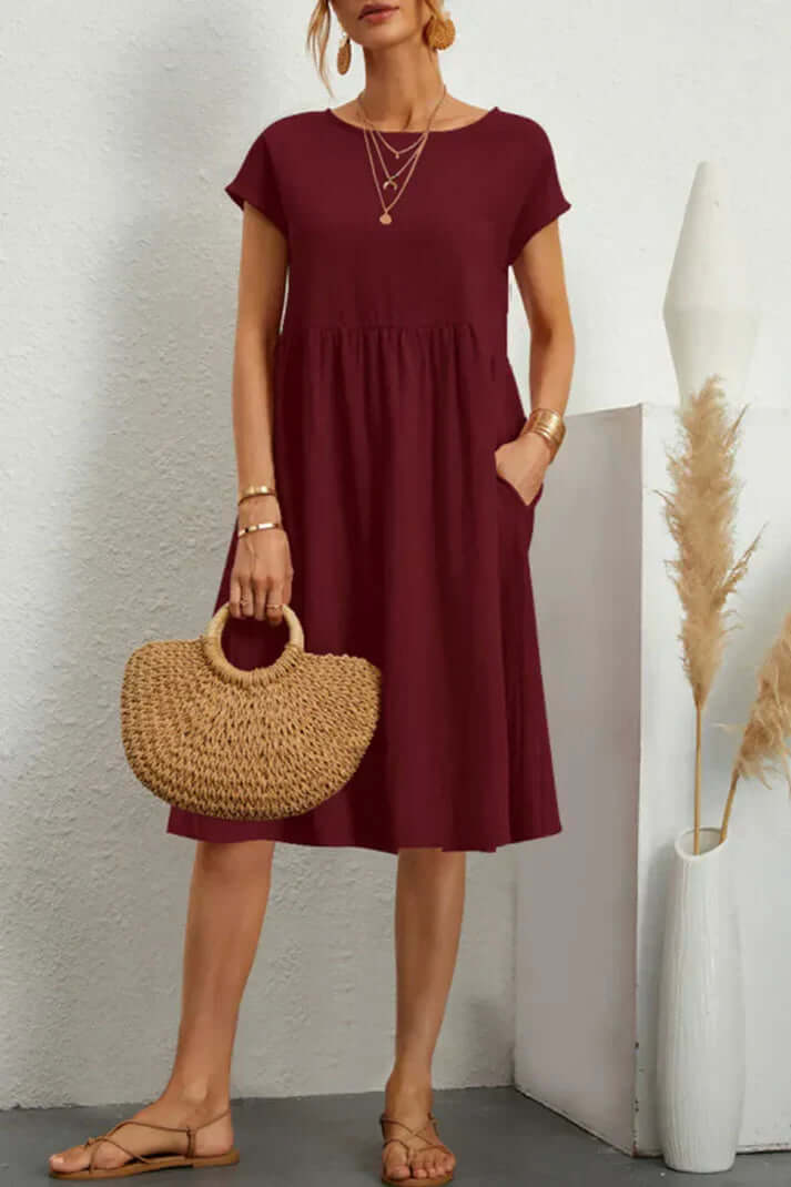Valenzora | Plain, casual dress with short sleeves and a round neckline