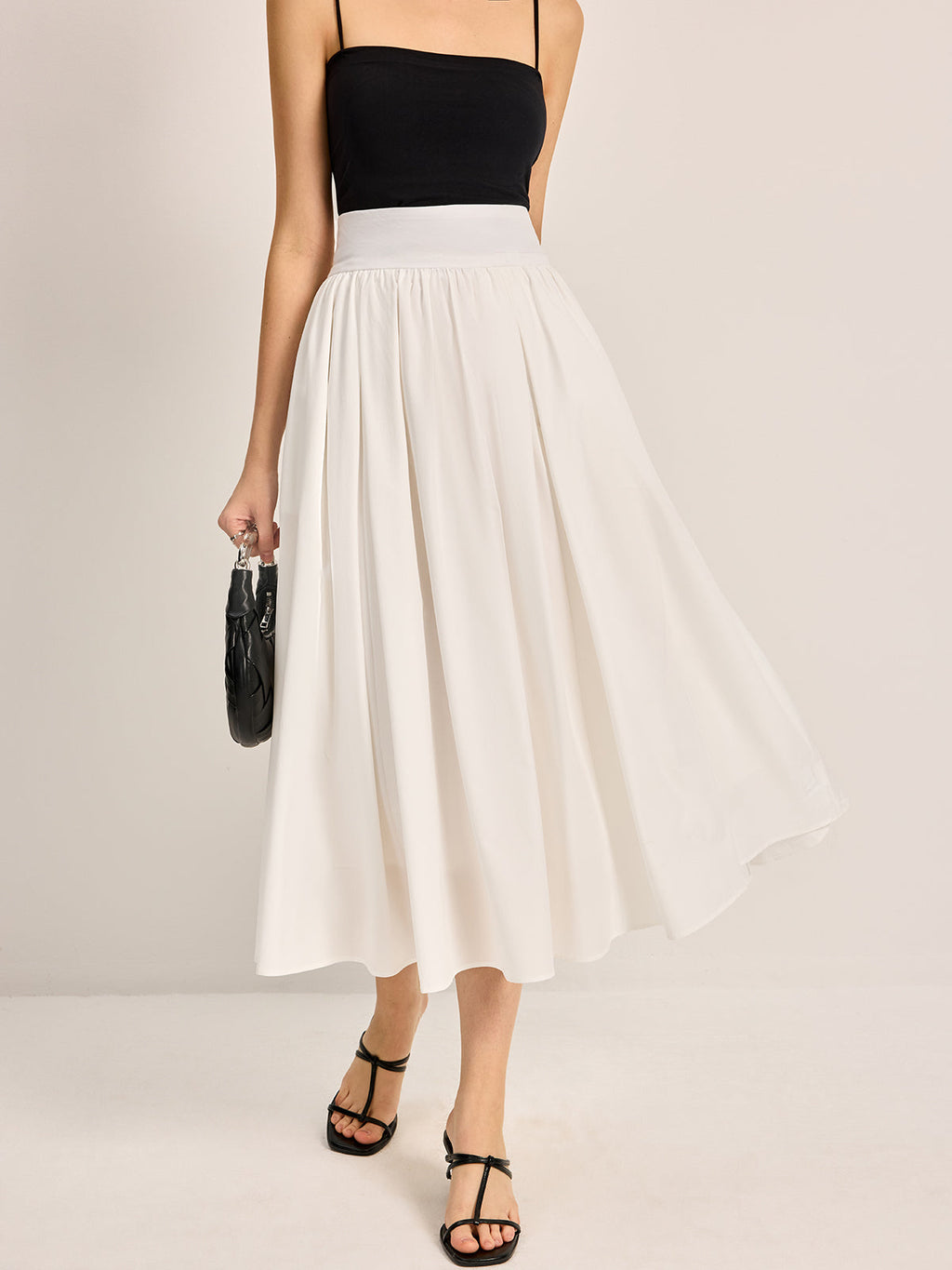Valenzora | Elegant A-line pleated skirt