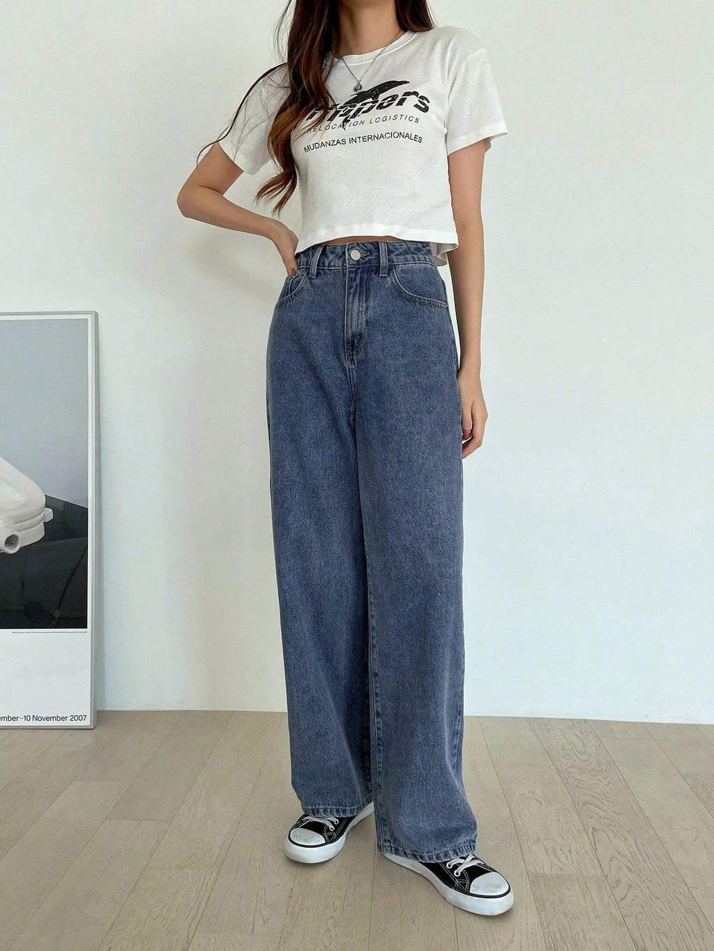 Valenzora | High-waisted washed wide-leg jeans