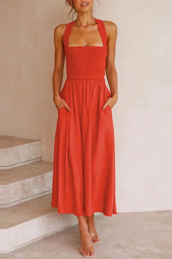 Valenzora | Midi dress with pockets and crossed ruffles on the back