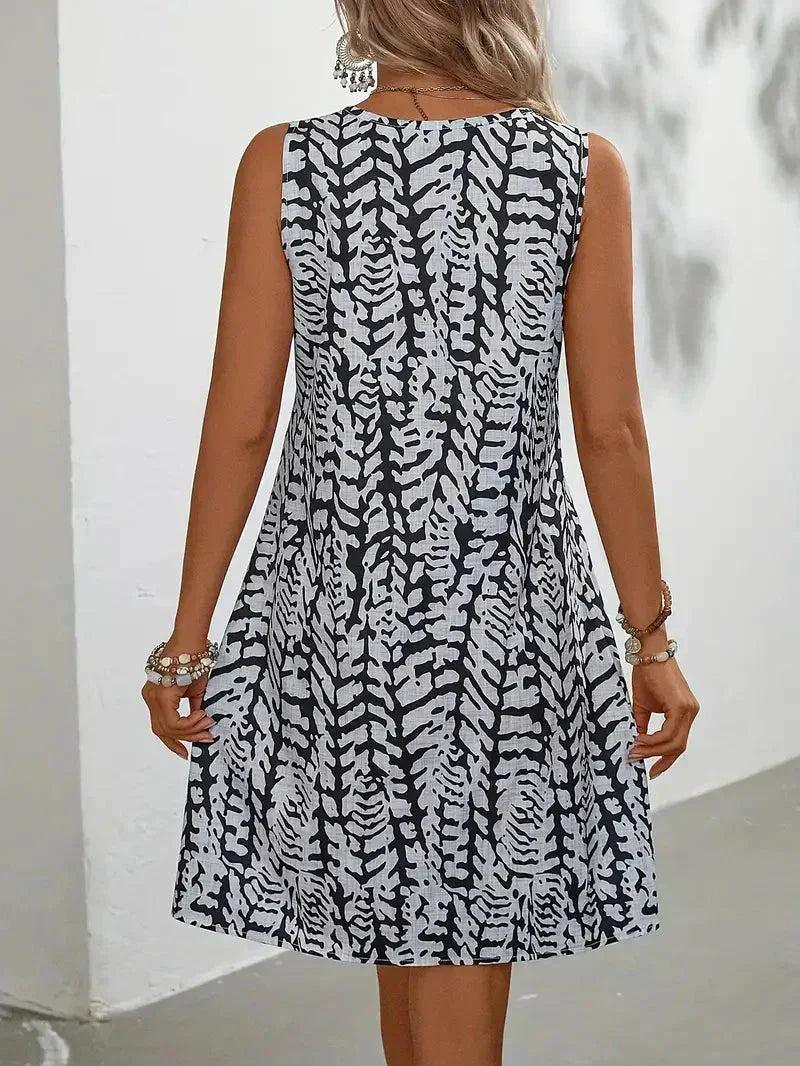 Valenzora | Sleeveless summer mini dress. Lightweight and breathable fabric.