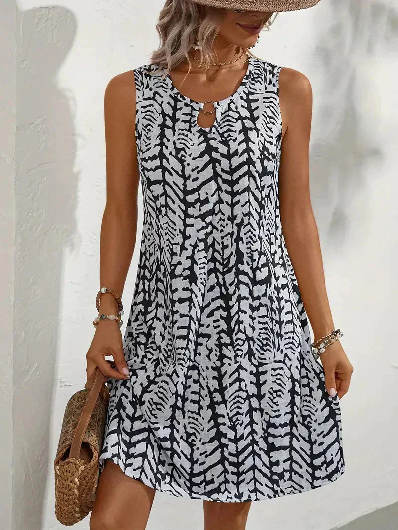 Valenzora | Sleeveless summer mini dress. Lightweight and breathable fabric.
