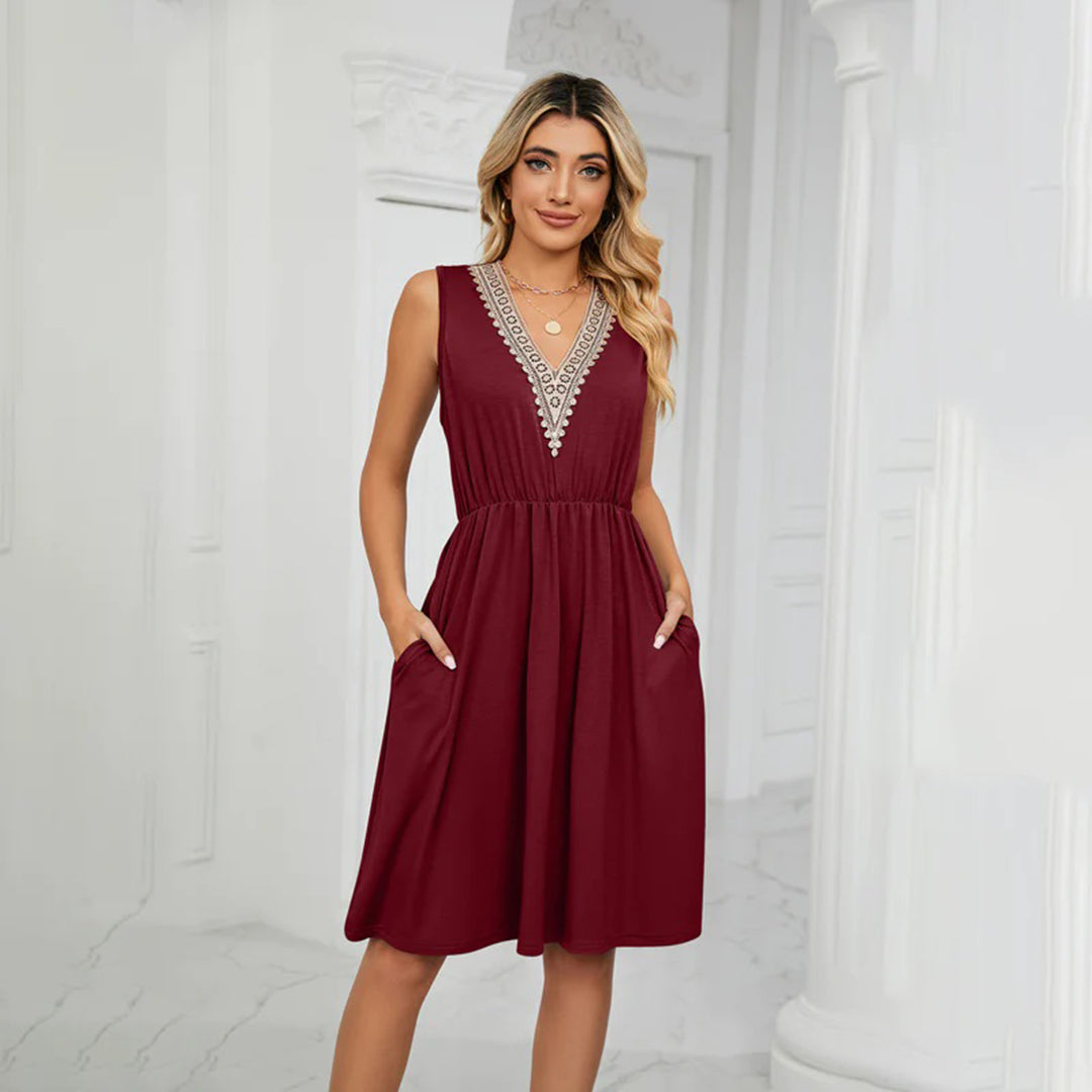 Valenzora | Ärmelloses Kleid, V-Ausschnitt, bestickt, figurbetont, Vokuhila-Saum, fließender Schnitt