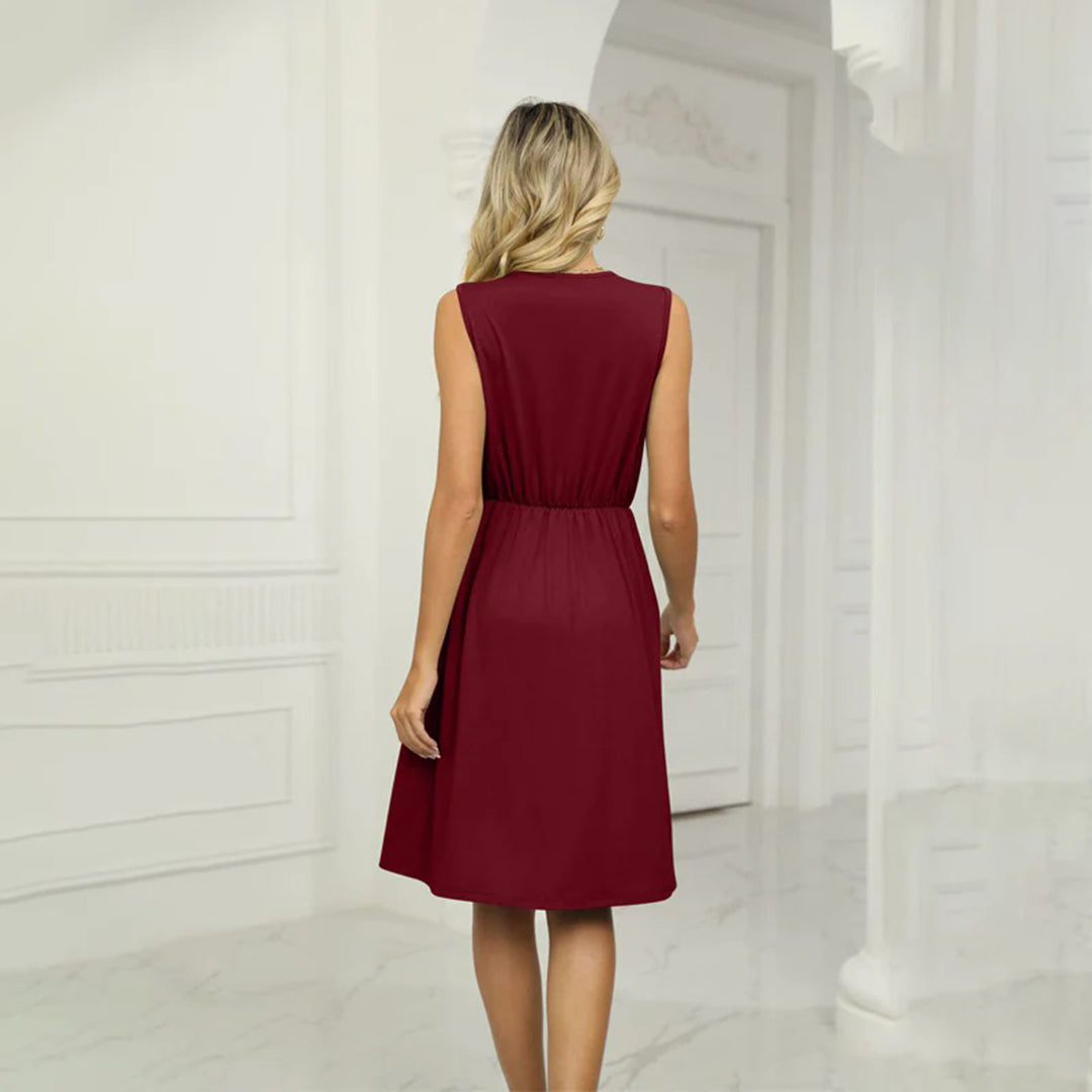 Valenzora | Ärmelloses Kleid, V-Ausschnitt, bestickt, figurbetont, Vokuhila-Saum, fließender Schnitt