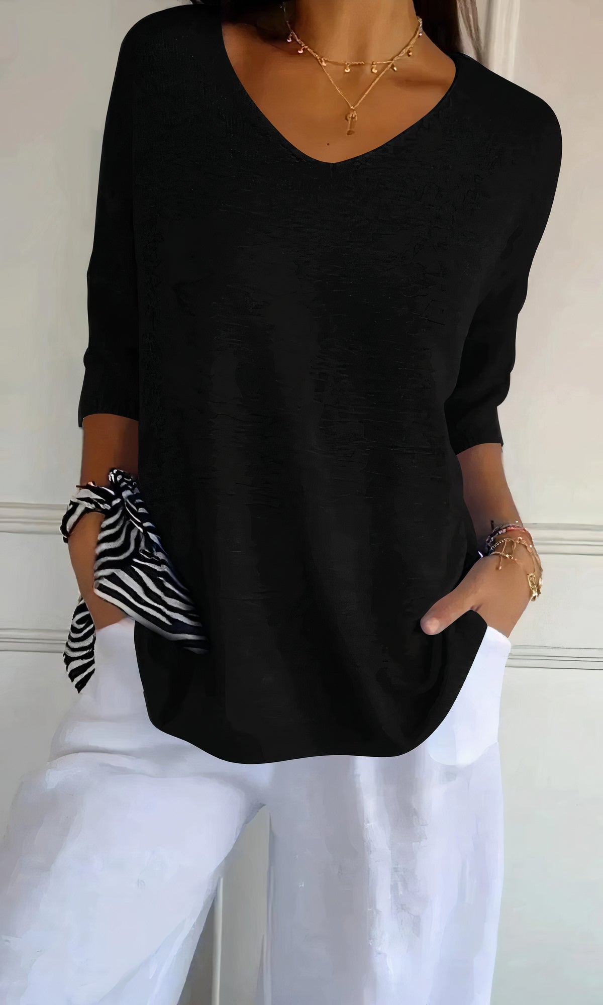 Knitted V-neck top for women