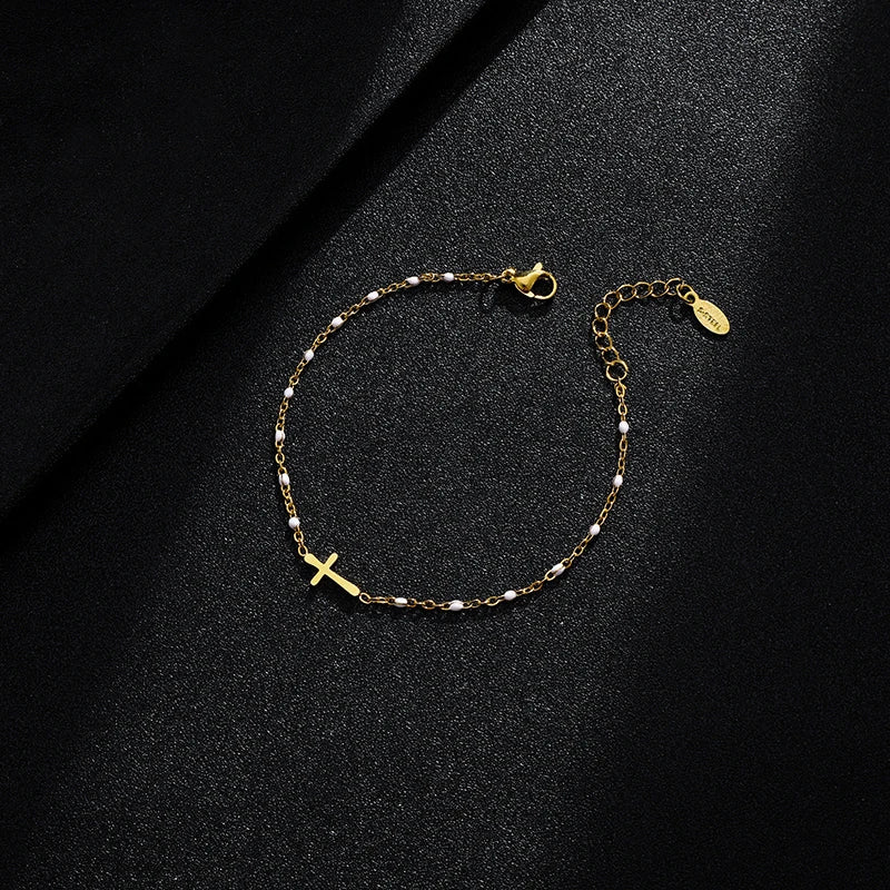 Valenzora | Gold-tone cross bracelet
