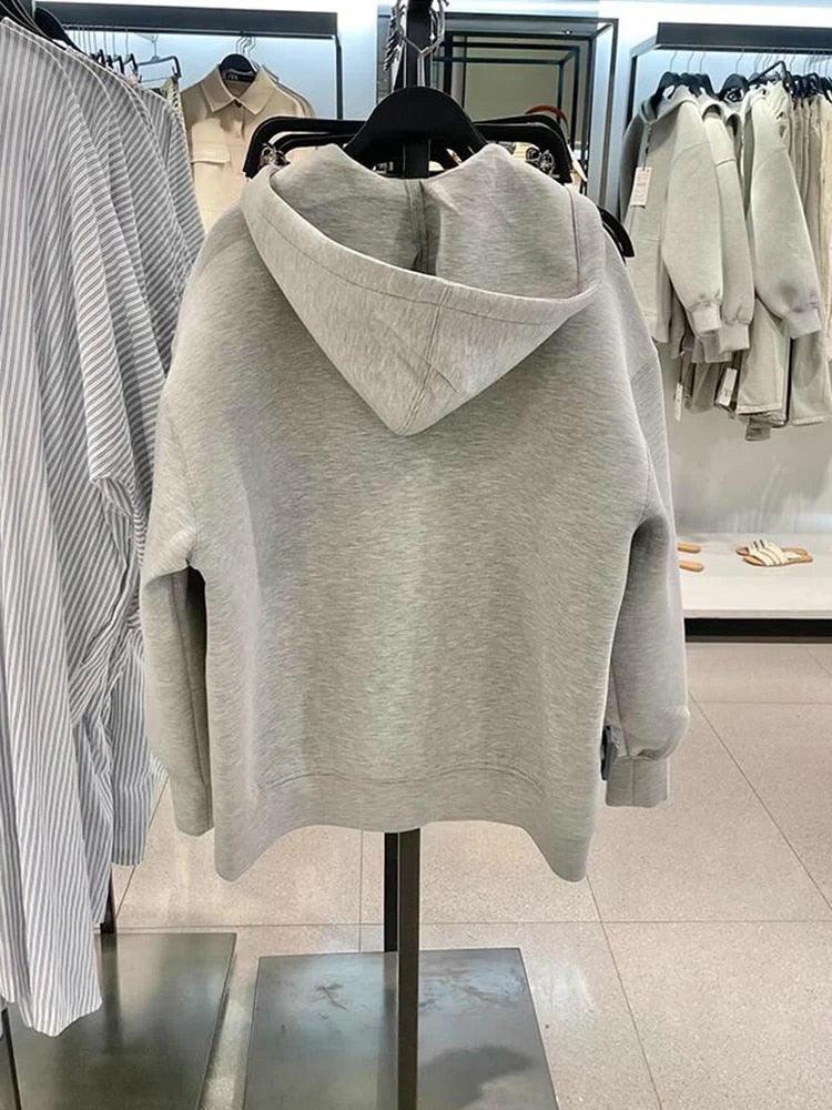 Warme Kapuzenweste für Damen