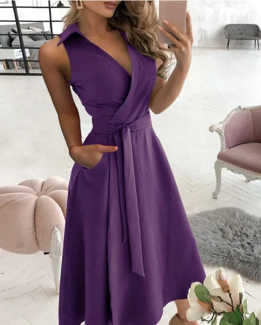 Valenzora | Wrap dress Sleeveless Collarless design Flattering waistband Knee-length