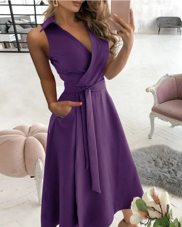 Valenzora | Wrap dress Sleeveless Collarless design Flattering waistband Knee-length