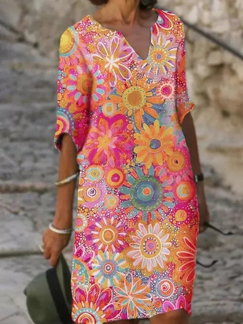 Valenzora | Midi dress with V-neck and floral pattern