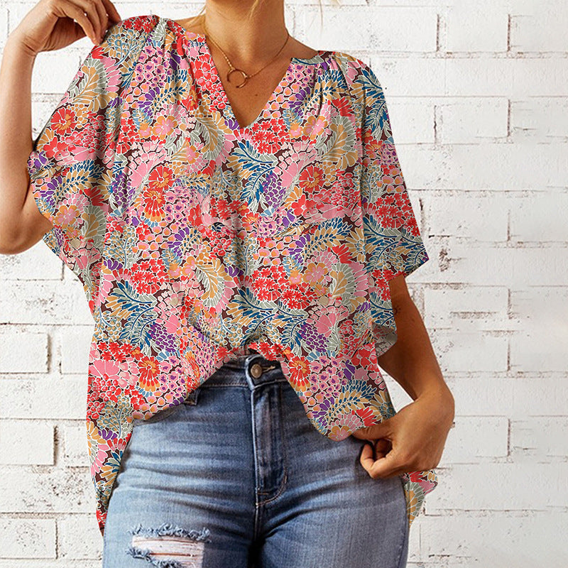 Women's blouse with floral design and relaxed fit, size