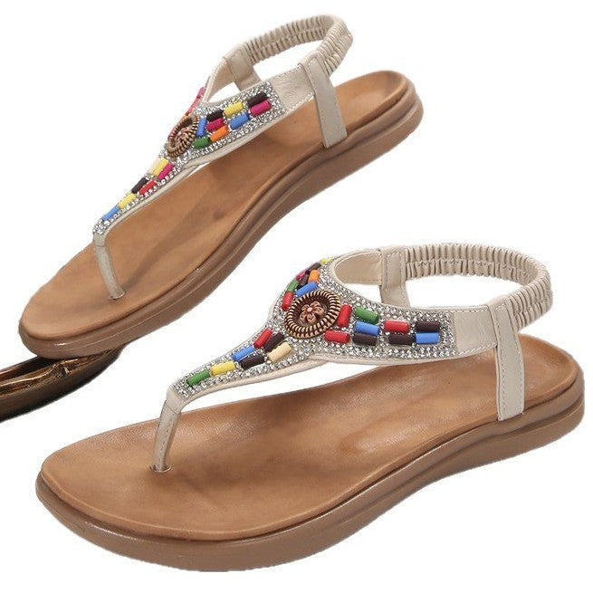Women's thong sandals with colorful decorative detail and comfortable footbed design, size Valenzora